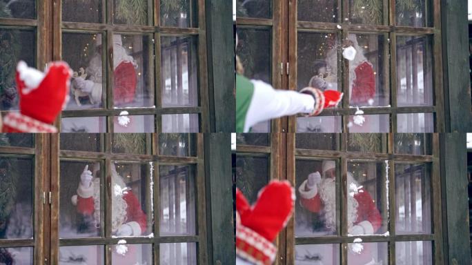 圣诞老人透过窗户看。