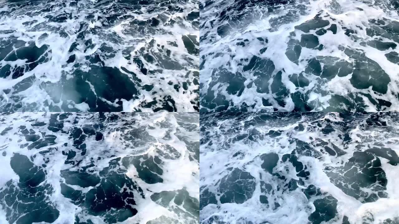 渡轮移动过程中海浪和海水飞溅的水滴