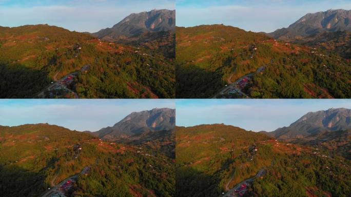 婆罗洲沙巴昆达桑黄金时段日出期间美丽的自然乡村空中风景镜头，无人机分辨率为4k
