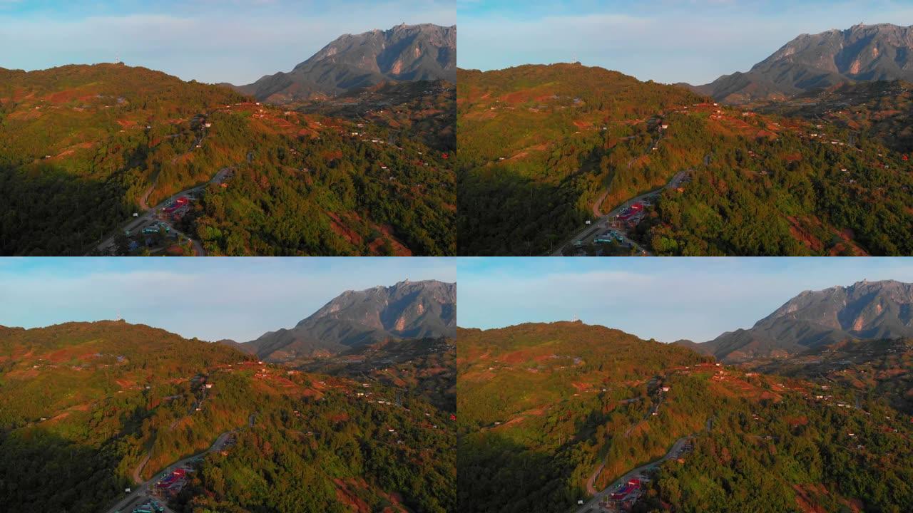 婆罗洲沙巴昆达桑黄金时段日出期间美丽的自然乡村空中风景镜头，无人机分辨率为4k