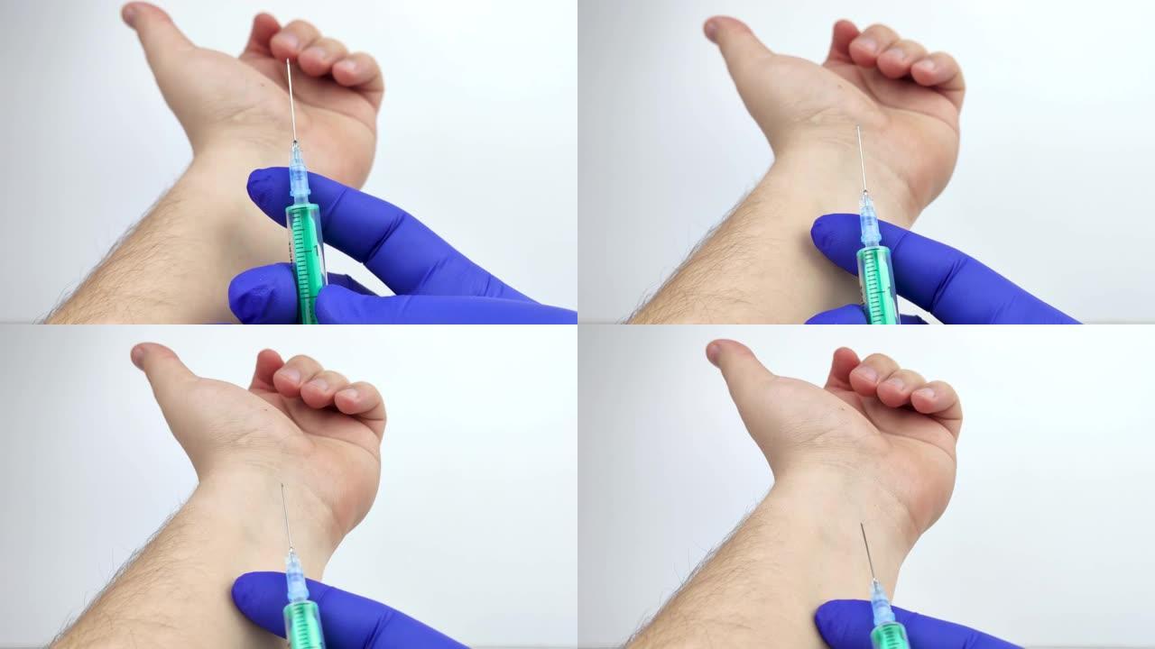 医生用注射器从手腕上的静脉抽血进行分析的手的宏视频。现代医学和实验室研究的概念。