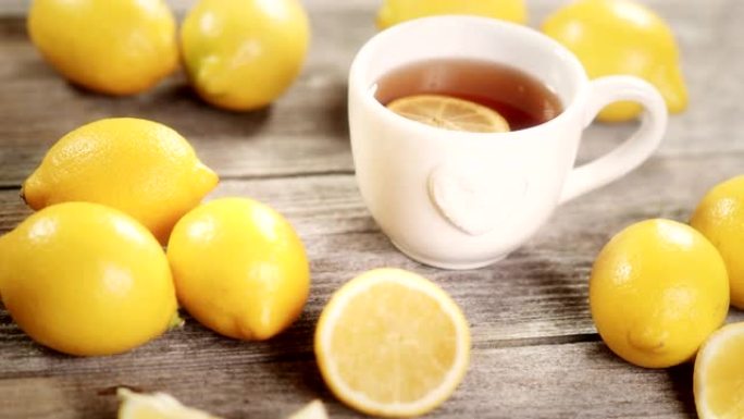 4k视频中的柠檬茶。维生素c预防流感感冒的概念
