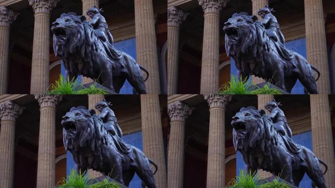 意大利西西里岛巴勒莫的马西莫·维托里奥·埃马努埃莱剧院前的狮子雕像。