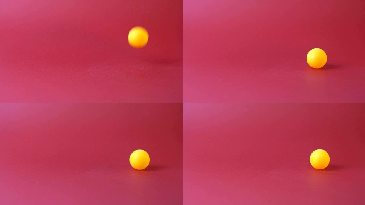 黄色球在红色背景上跳跃