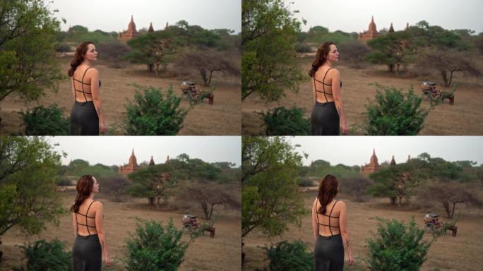 女人看着蒲甘遗址的风景