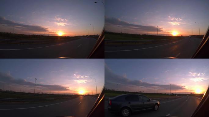傍晚的日落，高速公路，开车旅行。4K。