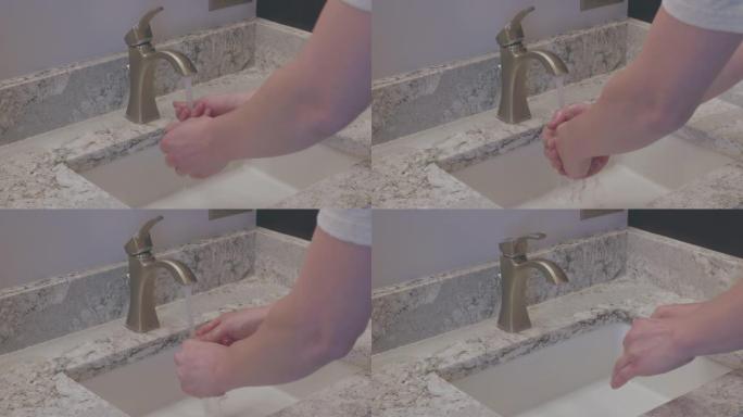 现代水槽水龙头，带男性洗手-慢动作