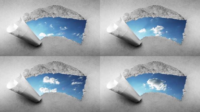 创意4k时间圈视频，在蓝天中快速移动的云，可以通过旧复古垃圾老式纸的边缘撕裂的孔看到。
