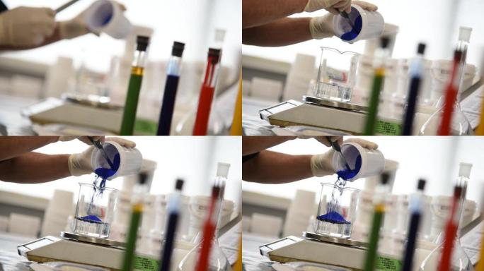 近距离观察在实验室工作的化学家