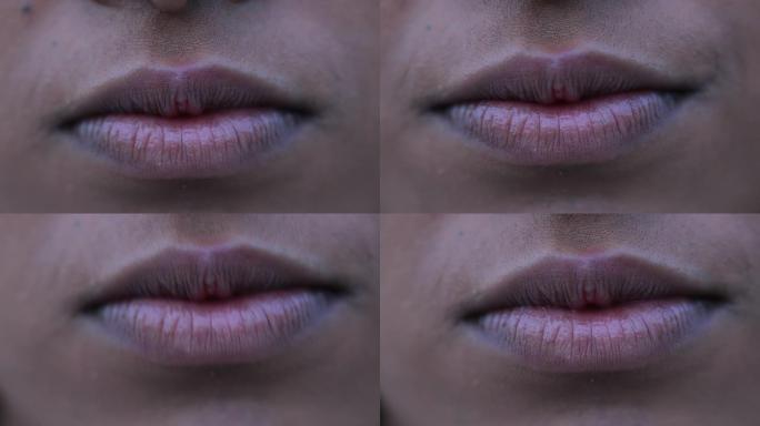 非裔美国妇女的嘴和嘴唇，宏观特写