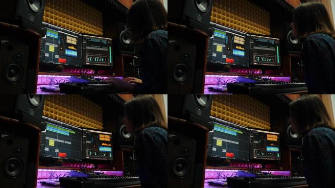 女音乐家在声音音乐工作室混音和母带歌曲，屏幕上有监视器和均衡器混音装置。音响工程师为新专辑创作流行歌