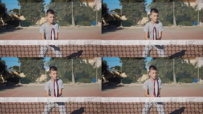 网球比赛，雄心勃勃的网球运动员男孩专注于比赛