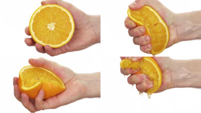 一个男人挤压一半成熟多汁的橘子的宏观镜头。柑橘汁滴下来。孤立，在白色背景上