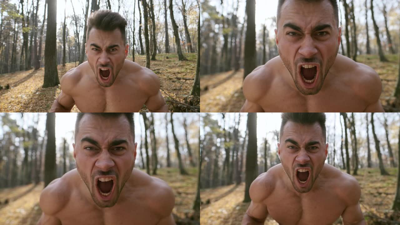 全身赤裸的强壮男人。树林里的家伙。他大声喊叫。显示它的力量。