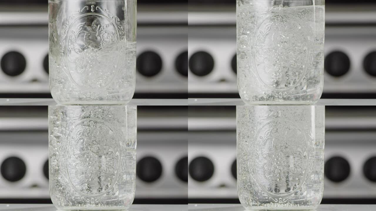 Pinging Sparkling Water Into a Glass