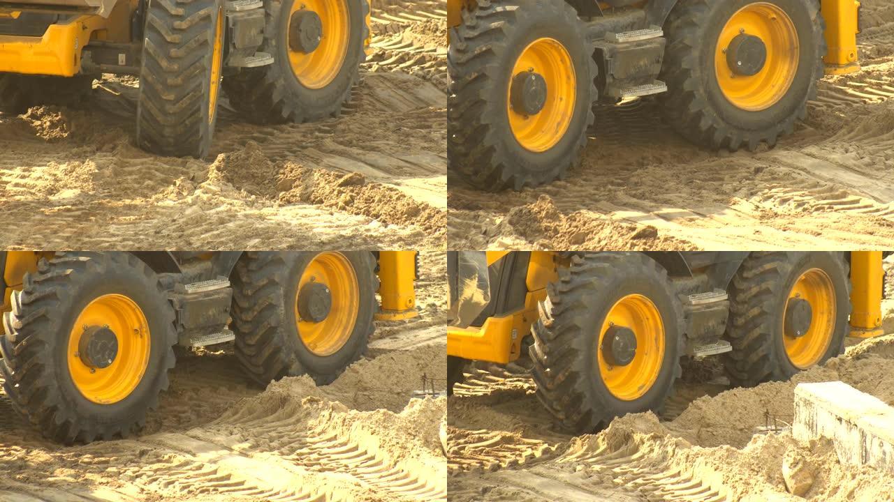 土壤中施工设备的轮子，以获得更好的抓地力、背景、工业