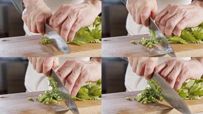 厨师刀切片芹菜叶的慢动作