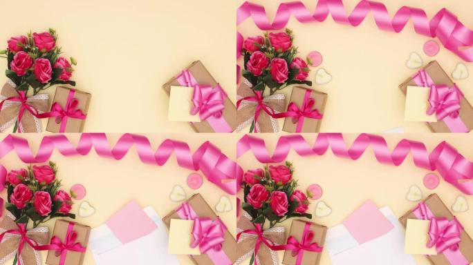 浪漫的粉红色装饰品，带有情人节，母亲节或妇女节的鲜花和礼物-Stop motion