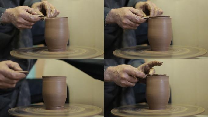 经验丰富的陶工创造了一个美丽的粘土花瓶