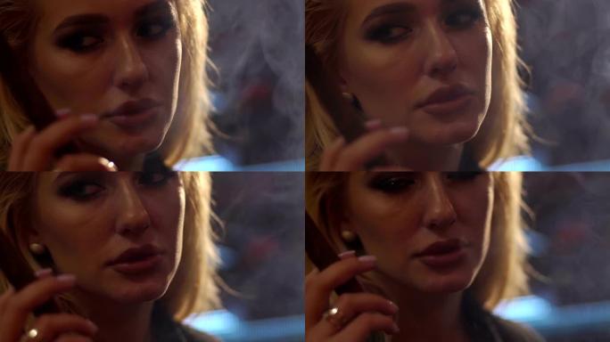一个女孩抽着雪茄的特写镜头，她对着镜头吐出很多烟雾。