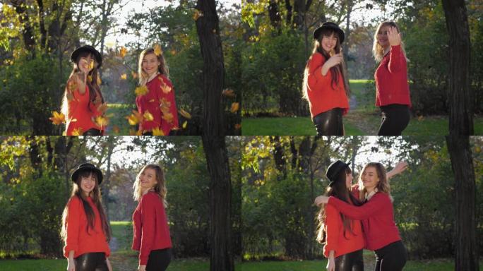 跟我来，迷人的年轻女友在温暖的晴天扔黄叶，在友好的散步中，在秋天的公园里打手势