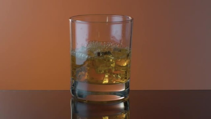 Pouring whiskey into a glass