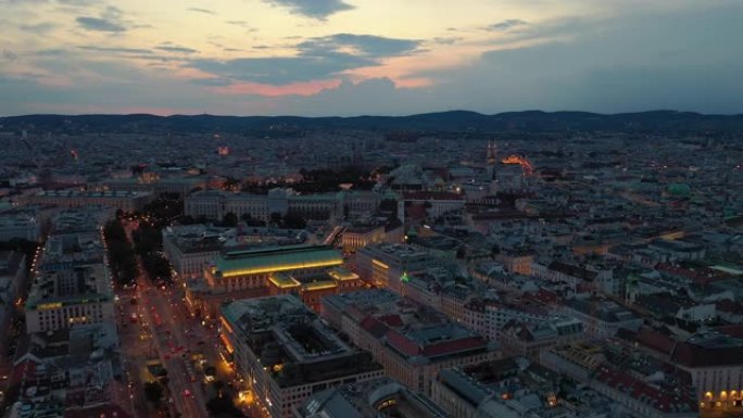 日落天空之夜照明维也纳市中心歌剧院交通街空中全景4k奥地利
