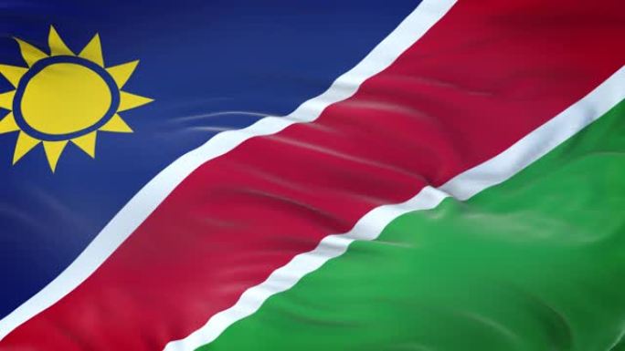 纳米比亚国旗在风中飘扬与高度详细的织物纹理。无缝循环