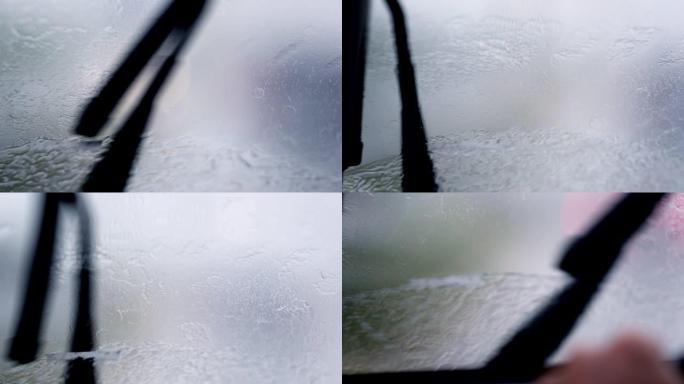 Pov汽车雨水在暴风雨困难的驾驶条件下飞溅挡风玻璃