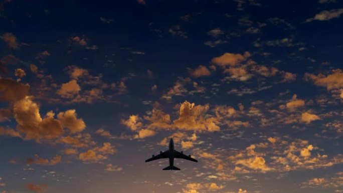 一架客机在日落云的背景下飞过头顶，休息和旅行的概念
