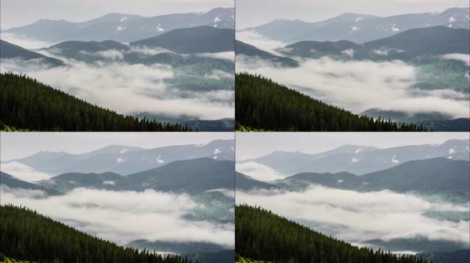 在山上覆盖的森林上移动的云层阴影的俯视图。延时