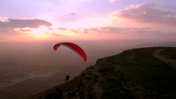 日落电影史诗极限运动中的滑翔伞