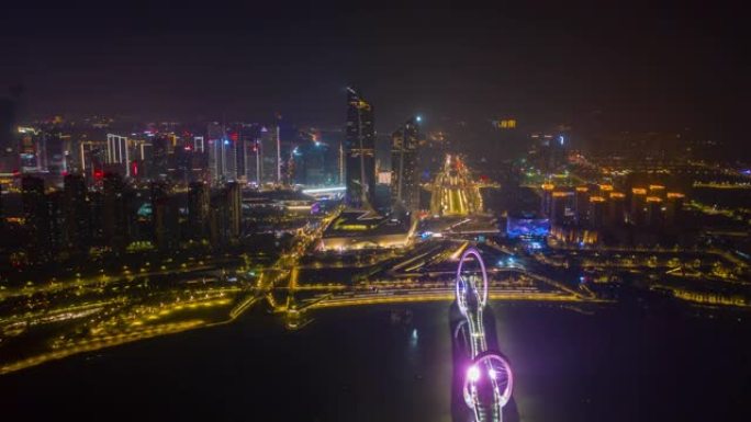 夜间照明南京市国际青年文化中心河眼桥空中延时全景4k中国