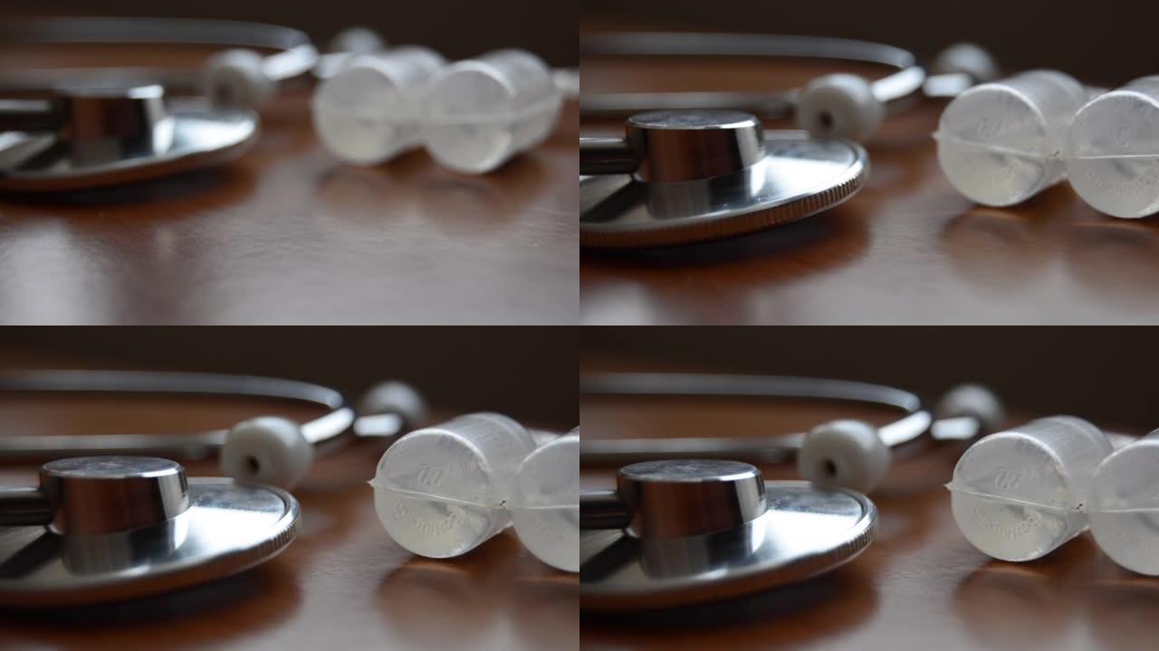 盐水灯泡和stethoscope close up shot。软焦点。