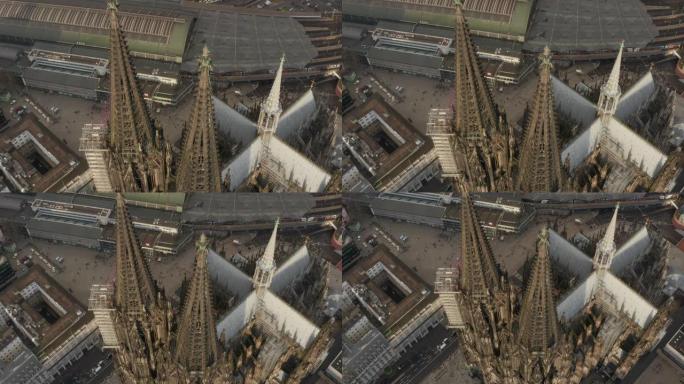 空中: 在美丽的阳光下，科隆大教堂棕色塔楼周围的高架圈 [4K]