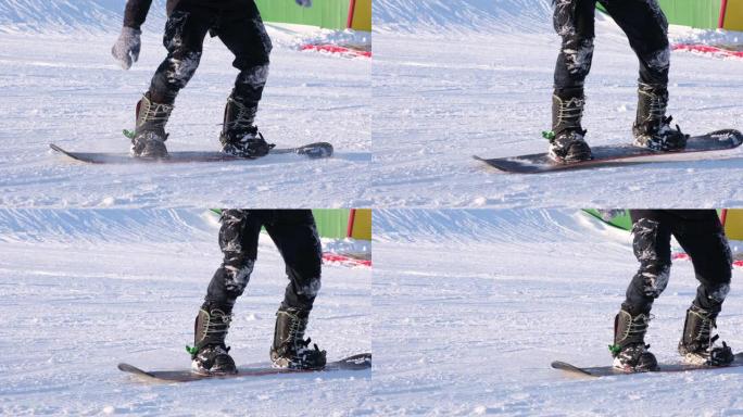 单板滑雪运动员跳上滑雪板，特写镜头