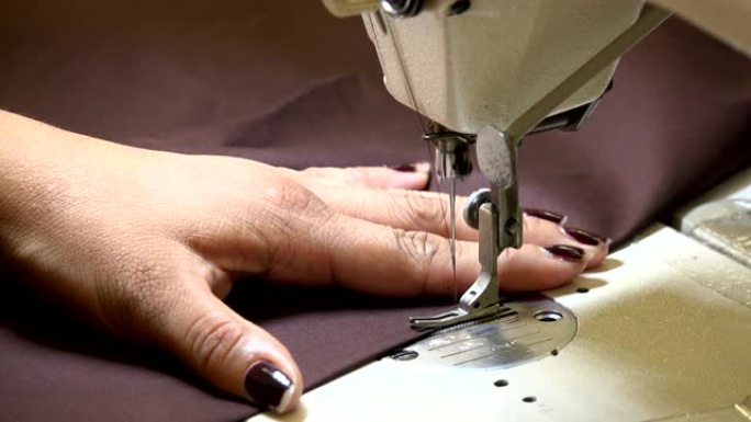 裁缝包边裙子手工业特写展示裁缝