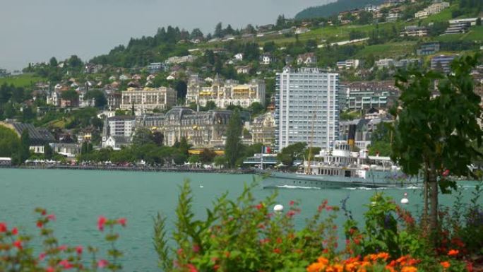晴天著名的日内瓦湖花湾蒙特勒市酒店慢动作全景4k瑞士