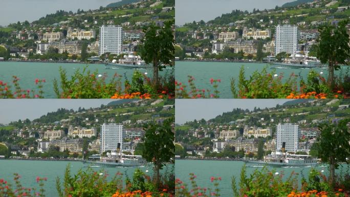 晴天著名的日内瓦湖花湾蒙特勒市酒店慢动作全景4k瑞士