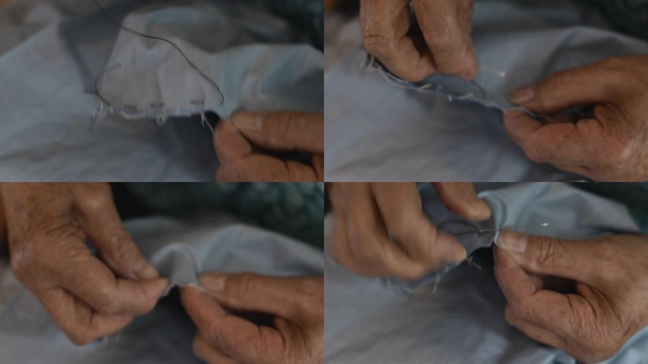 老人类的手手工针织毛衣织布手工艺术