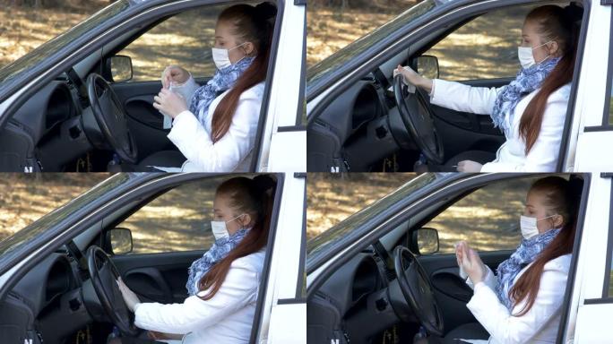 疾病和流行病期间的预防措施-一名妇女戴上医用口罩，用消毒湿巾擦拭汽车方向盘，防止冠状病毒