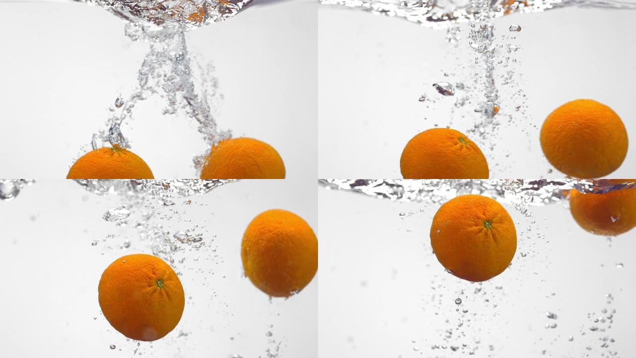 新鲜橙子掉入水中的超级慢Mo