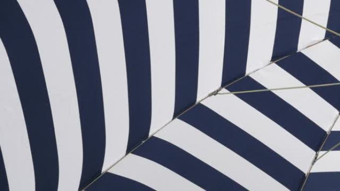 具有催眠效果的蓝白沙滩阳伞4K