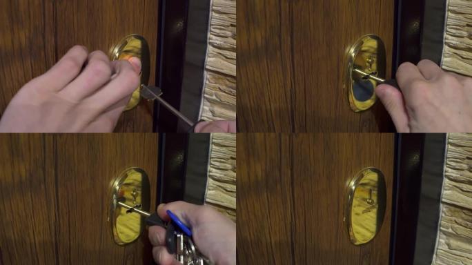 一个人的手将钥匙插入钥匙孔，然后打开和关闭门。特写。