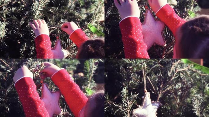 圣诞树农场上穿着红色连衣裙的小女孩。