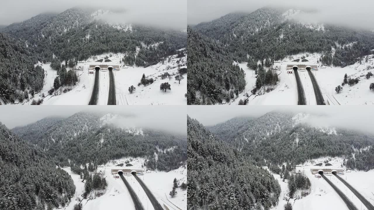 无人机飞越白雪覆盖的森林，卡斯塔莫努市伊尔加兹山隧道，土耳其