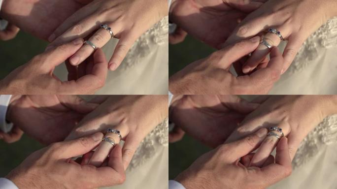 新娘和新郎在婚礼上交换结婚戒指。