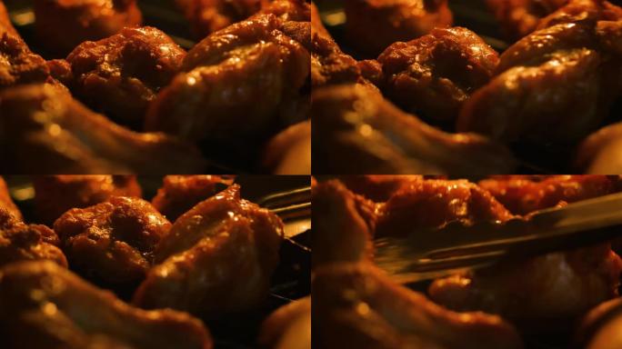 特写镜头在热烤箱里烧烤烧烤鸡肉