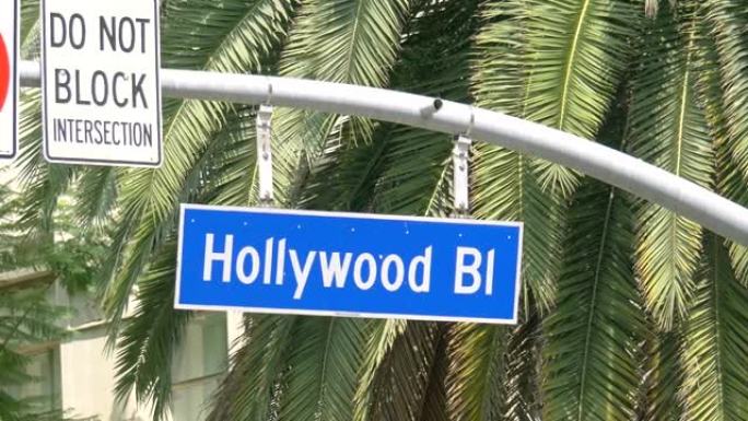 慢动作60fps的4k好莱坞大道街道标志和交通信号灯