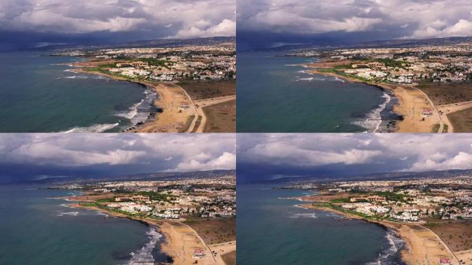 塞浦路斯帕福斯度假小镇的鸟瞰图。海边有海岸的海岸线和酒店。地中海旅游概念